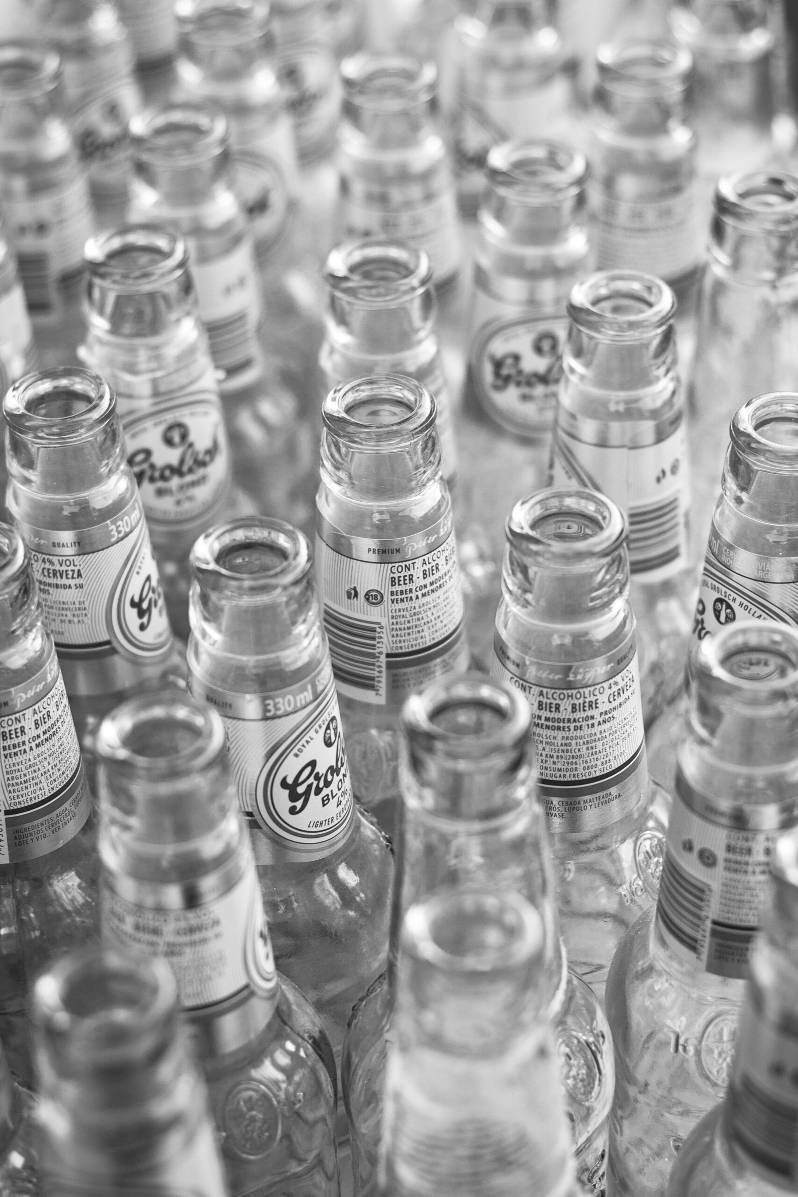 grayscale photo of glass bottles | Hyderabad growth